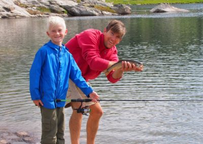 Happy fishermen in the beartooths with a trout