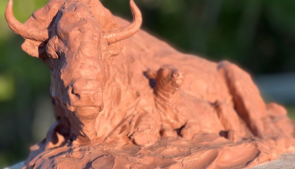 Bison cow and calf sculpture in clay George Bumann