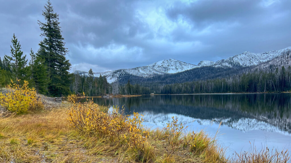 Fall colors and snow at Sylvan Lake Yellowstone Fall Basecamp